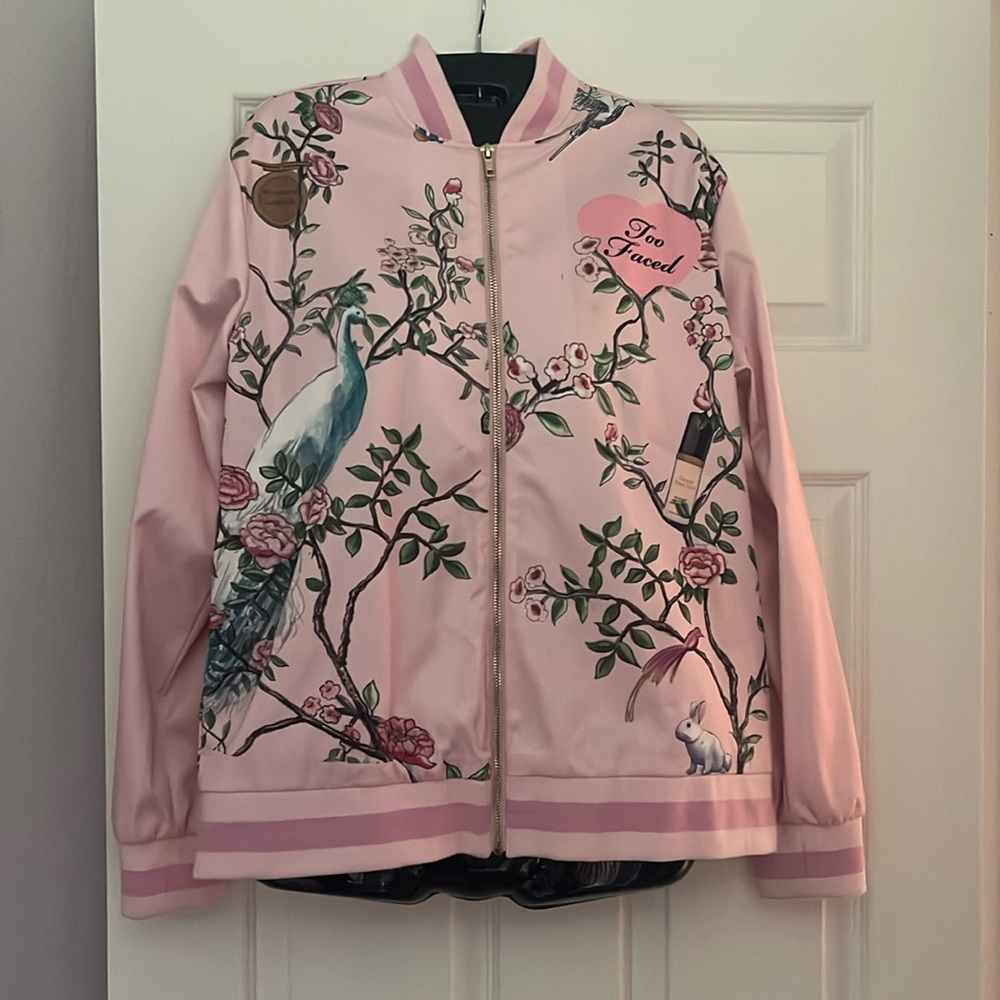 Limited edition, Pink bomber jacket sold on TOO FACED website.
